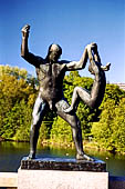 Oslo, Norway. Vigeland Park. Sculptures of the bridge, Man lifting girl with one arm.